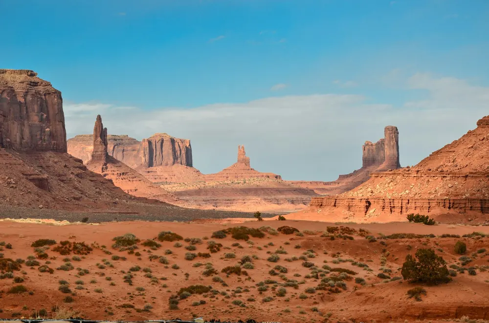 Red rock buttes across a wide desert valley
